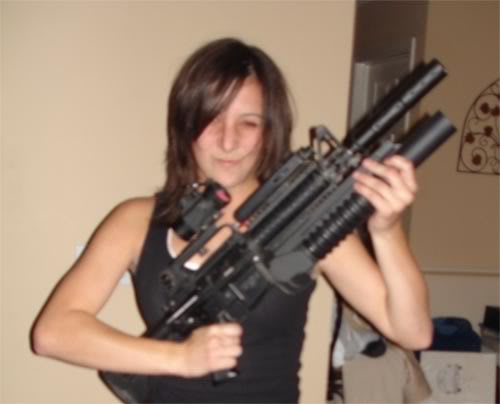 Name:  aliciaandgun.jpg
Views: 5
Size:  23.2 KB